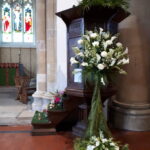 White lilies on the pulpit