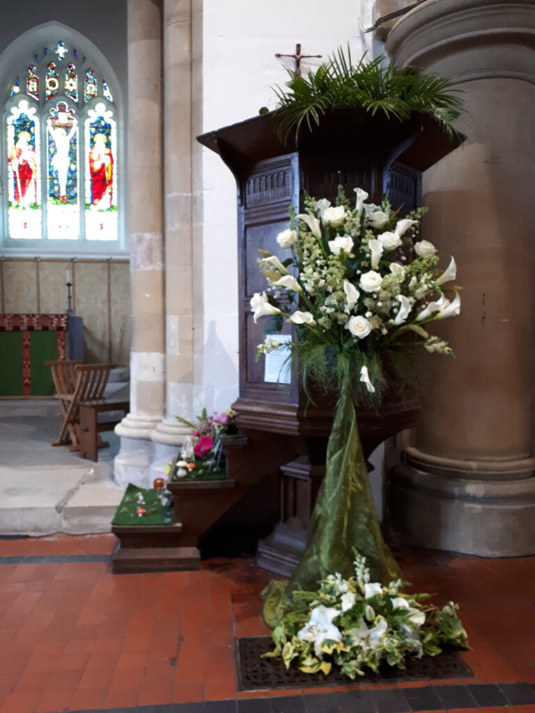 White lilies on the pulpit