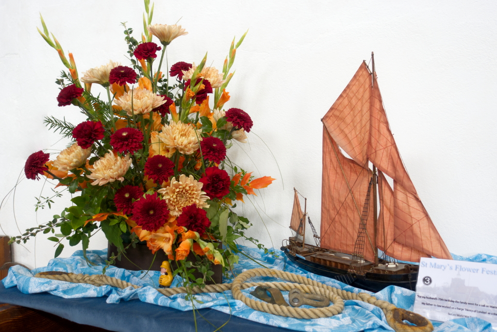 Autumn colours in flowers and sail