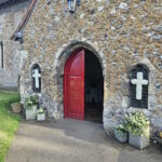 Church door with Easter flowers